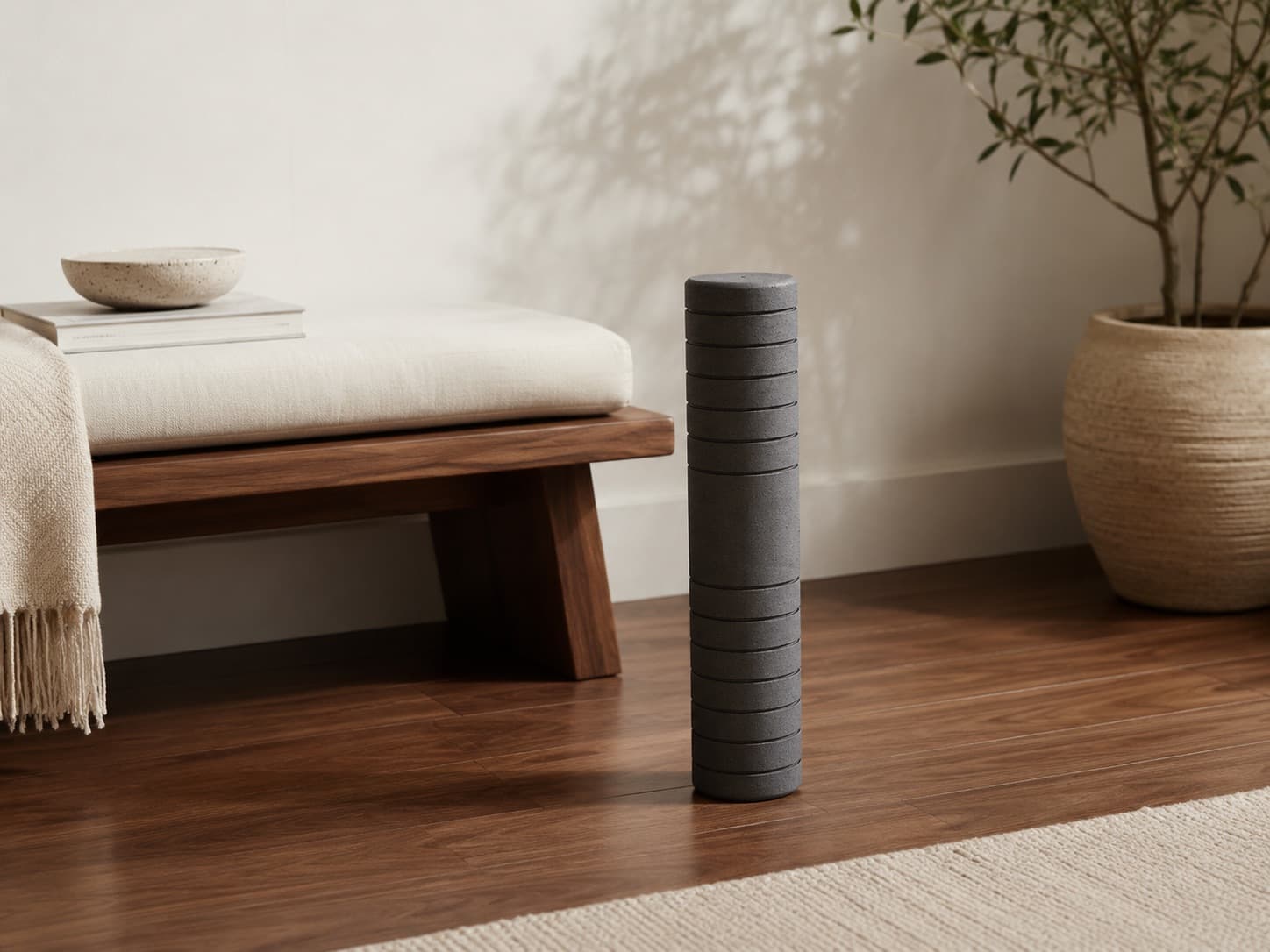 The original Sōmagroove cork roller resting on hardwood in warm light
